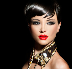 Beauty fashion model girl with short hair. Rocker style brunette