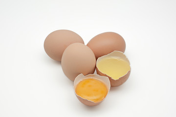 Broken egg isolated on white background. separated egg white and yolk