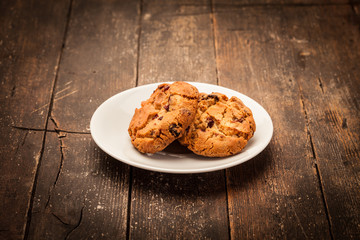 Homemade biscuits over ancient wooden table