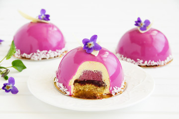 Bush blueberry cake with cream and creamy mousse.