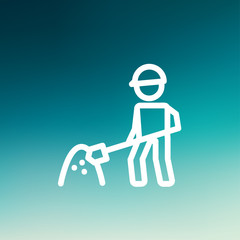 Worker with hard hat and shovel in building site thin line icon