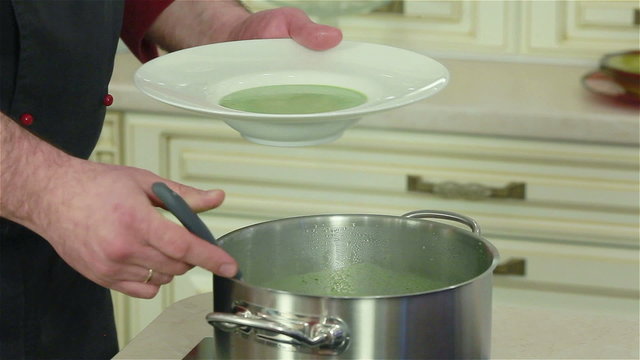 Spinach soup is being given the finishing touches