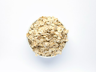 Oatmeal in white piala on a white background