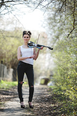 beautiful girl with a violin in his hands © teksomolika