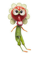 Funny man in glasses made of vegetables