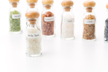 white topaz in glass bottle
