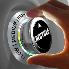Hand rotating a button and selecting the level of recycling.
