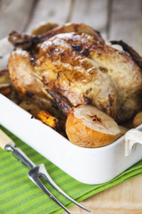 Roasted Chicken with apples and potatoes