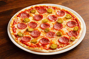 pizza on wood background