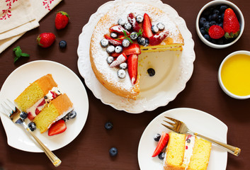 Genoise (cake) with cream, berries and lemon cream.