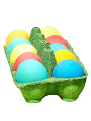 Multicolored easter eggs in a pot.Isolated on white background.