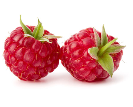 ripe raspberries isolated on white background close up