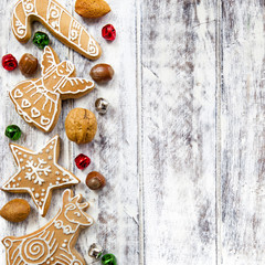 Christmas gingerbread cookies on white table