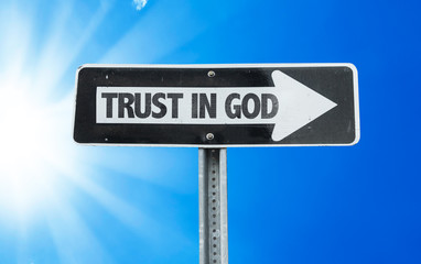Trust in God direction sign with a beautiful day