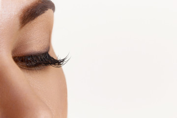 Naklejka premium Close up of natural female eye isolated on white background