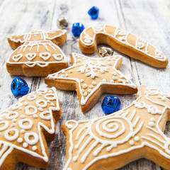 Christmas gingerbread cookies on white table