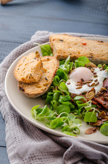 Lamb's lettuce salad with poached egg and nuts