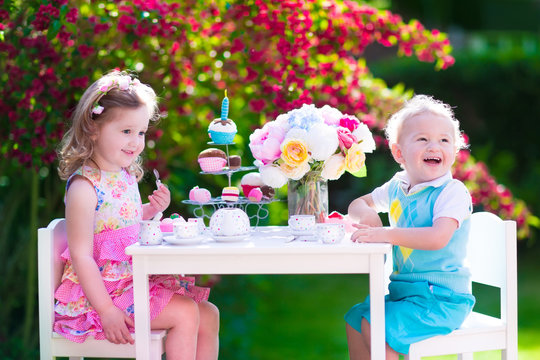 Kids having fun at garden tea party