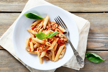 pasta with sauce and mushrooms in a bowl