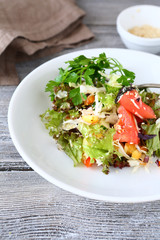 Light salad with vegetables on a plate