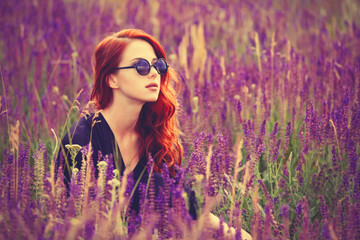 girl with sunglasses on lavender field.
