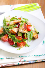 Chicken breast, rocket, cucumber and tomato salad