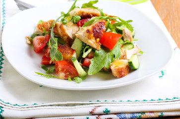 Chicken breast, rocket, cucumber and tomato salad