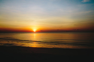 Sunrise , the sea at thungwualaen beach , Thailand.