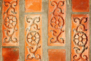 Brick with floral patterns