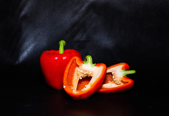 red pepper isolated on black background