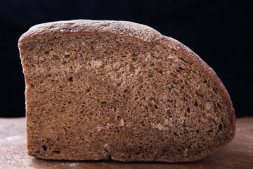 Surface of Sliced Bread Isolated on Black Background