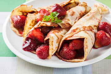 Traditional crepes served with strawberries