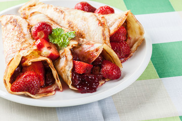 Traditional crepes served with strawberries