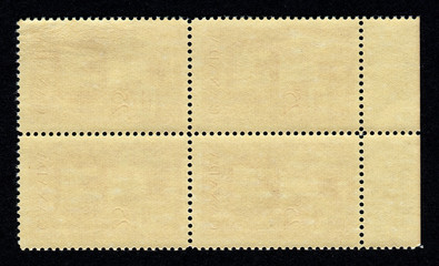 Obraz premium Reverse side of a postage stamp.