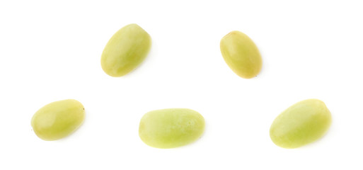 Five single white grapes isolated