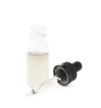 Small bottle with a pipette isolated