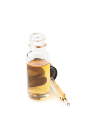 Small bottle with a pipette isolated