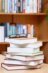 Books at the table in a library 
