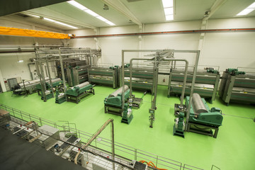 View of a modern processing unit machinery for olive oil.