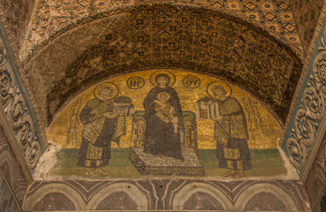 Fototapeta na wymiar Mosaic art in the wall of Church of Holy Sepulchre in Jerusalem