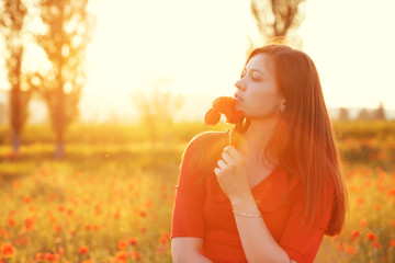 Woman in field in sunlight