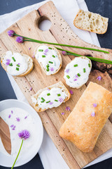 Mini sandwich with a cottage cheese and fresh chives