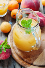 Sweet fresh peach juice with ice