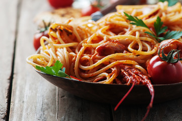 Italian spaghetti with shrimps and tomato