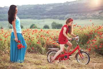 Mother with her child on bicycle