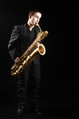 Fototapeta na wymiar Saxophone Player Saxophonist playing jazz
