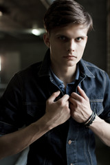 Stylish man wears a denim jacket