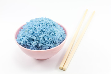 Cooking rice with butterfly pea water.