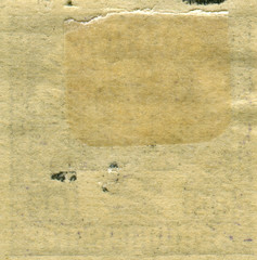 Reverse side of a postage stamp.