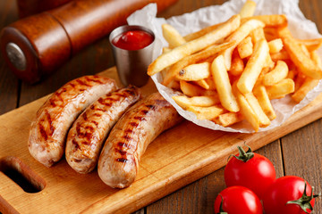 Fried sausages with fries